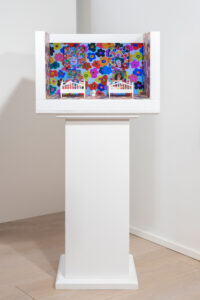 "Between the Sheets", multilayer painted with water-based paint, 3 mm forex print, 22'' monitor, Good Morning video 2' 47'', Bonjour Bonjour video 3' 40'', 37 x 57 x 41 cm, and. 3 + 2 AP, 2024, ph. Francesco Squeglia